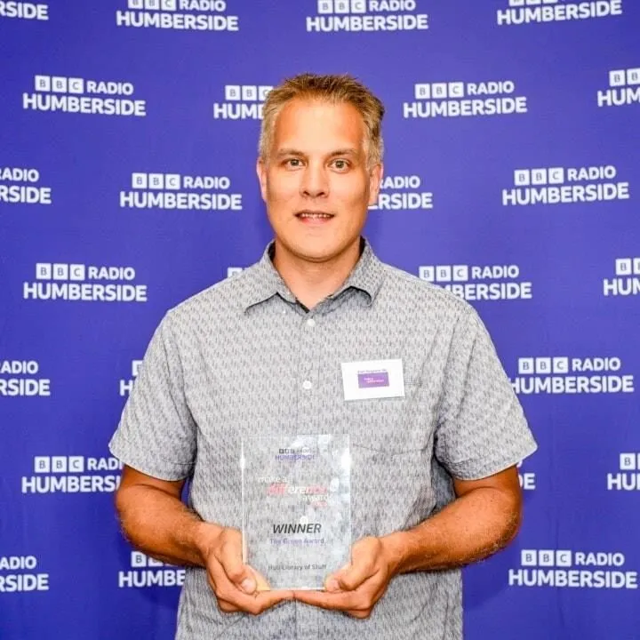 Holding the BBC Make a Difference Award at BBC Radio Humberside